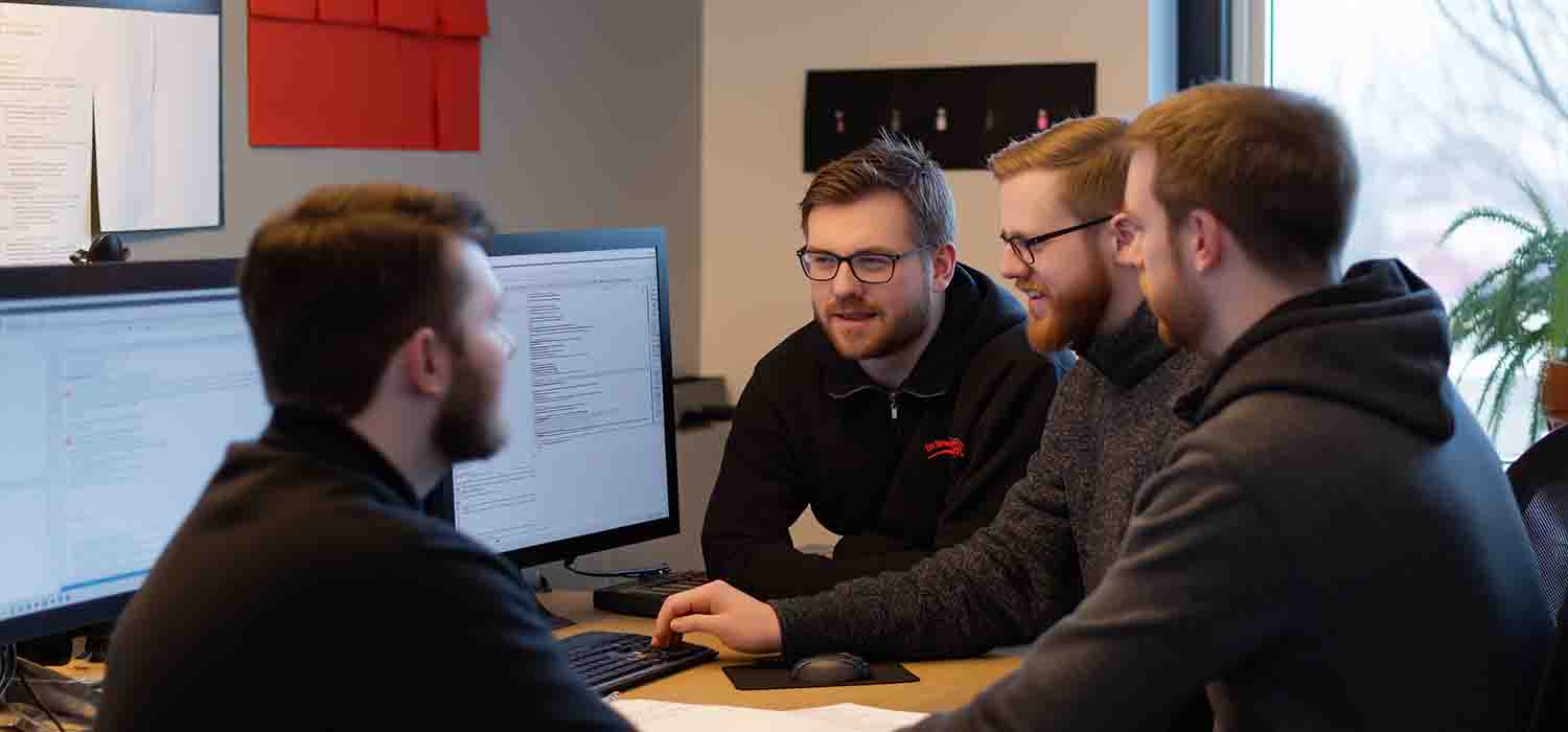 Small business team reviewing antivirus solutions on desktop