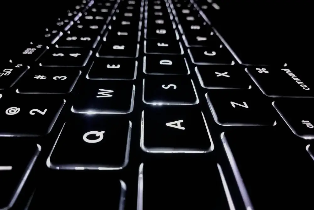 Close-up of a backlit black keyboard